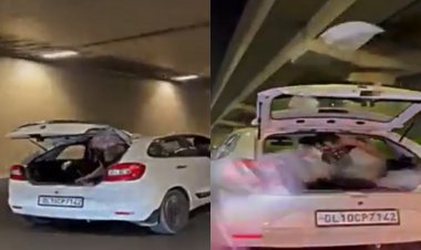 Gurugram: नकाबपोश ने चलती कार की डिक्की से रोड पर बरसाये नोट, video viral